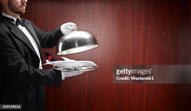 butler presenting model of airbus a380 - airplane tray stock pictures, royalty-free photos & images