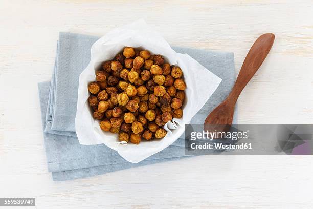 roasted chickpeas in bowl - chickpea stock pictures, royalty-free photos & images
