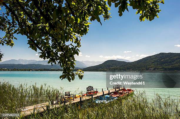 austria, carinthia, jetty at lake woertherses - kärnten stock-fotos und bilder