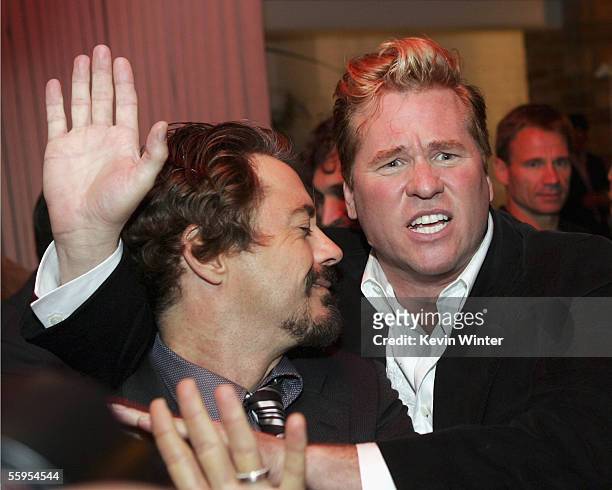 Actors Robert Downey Jr. And Val Kilmer pose at the afterparty for the premiere of Warner Bros. Picture's "Kiss Kiss Bang Bang" at the Hollywood...