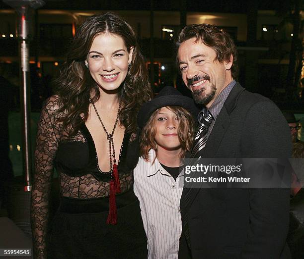 Actress Michelle Monaghan , actor Robert Downey Jr. And his son Indio pose at the afterparty for the premiere of Warner Bros. Picture's "Kiss Kiss...