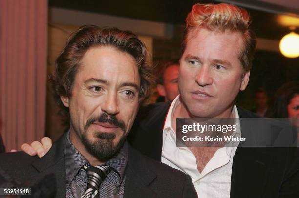 Actors Robert Downey Jr. And Val Kilmer pose at the afterparty for the premiere of Warner Bros. Picture's "Kiss Kiss Bang Bang" at the Hollywood...