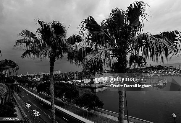 Helio Castroneves drives the Team Penske Dallara Honda ahead of team mate Ryan Briscoe during the IRL IndyCar Series Honda Grand Prix of St....