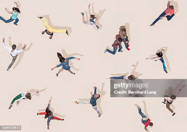 young people jumping like dancers, aerial views - danser photos et images de collection