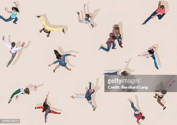 young people jumping like dancers, aerial views - remote location stock pictures, royalty-free photos & images