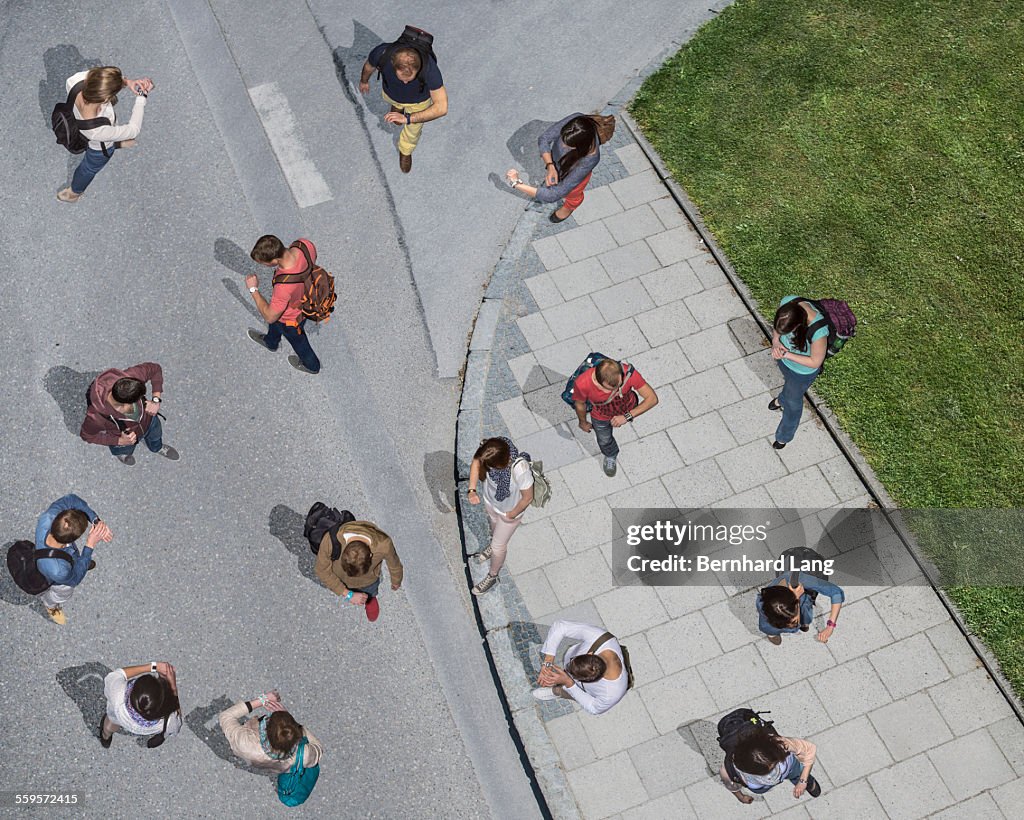 Group of people looking on watches, Aerial Views