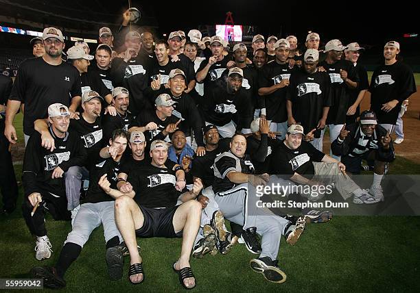 The Chicago White Sox gather on the field for a group photo after they win the American League Pennant by a score of 6-3 against the Los Angeles...