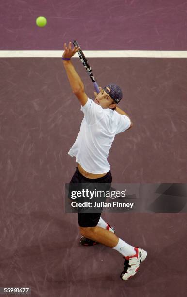 Andy Roddick of USA in action against Ivo Karlovic of Croatia in the second round of the ATP Madrid Masters at the Nuevo Rockodromo on October 19,...