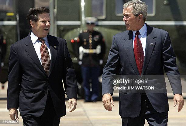 Houston, UNITED STATES: In this 26 April file photo, US President George W. Bush and House Majority Leader Tom Delay, Republican of Texas, walk off...