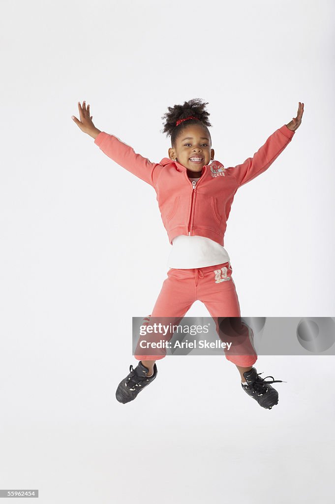Young girl jumping