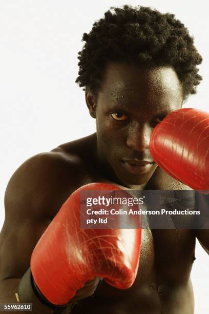 male boxer fighting - fighting stance stock pictures, royalty-free photos & images