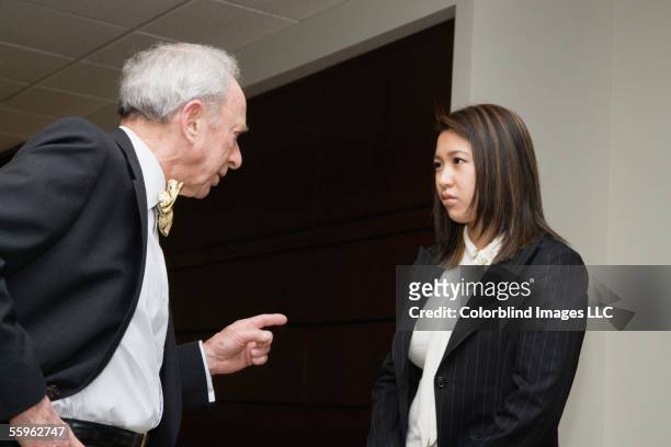 businessman confronting employee - assertiveness stock pictures, royalty-free photos & images