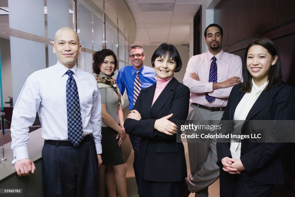 Portrait of businesspeople looking at camera