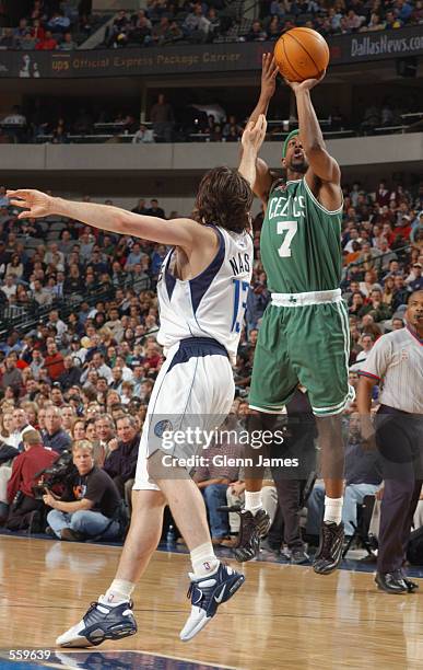 Point guard Kenny Anderson of the Boston Celtics shoots over point guard Steve Nash of the Dallas Mavericks during the NBA game at American Airlines...