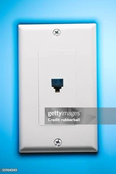 close-up of a network connection plug socket on a wall - tomada de ligação à rede imagens e fotografias de stock