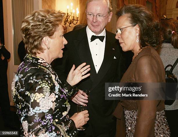 Mrs Maria Jose Ritta talks with Queen Paola of Belgium during a reception at the Cercle Gaulois in Brussels on October 19, 2005 in the Belgian...