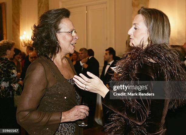 Mrs Maria Jose Ritta talks with Princess Claire of Belgium during a reception at the Cercle Gaulois in Brussels on October 19, 2005 in the Belgian...