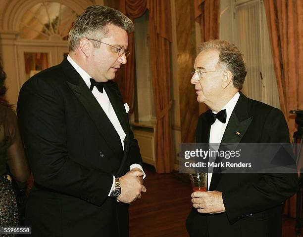 Prince Laurent of Belgium and Portuguese President Jorge Sampaio toast during a reception at the Cercle Gaulois in Brussels on October 19, 2005 in...