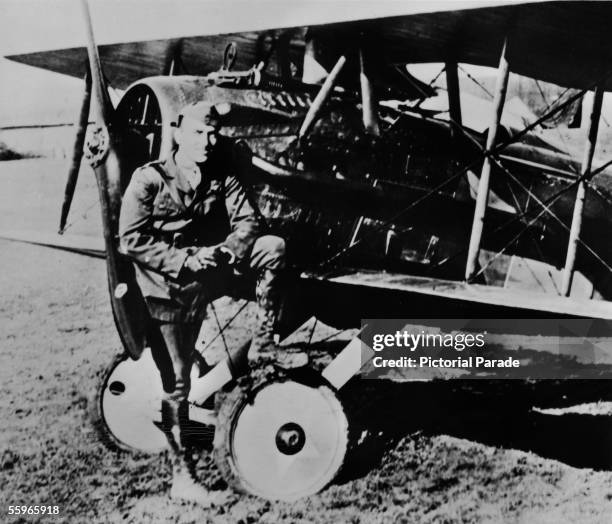 American fighter pilot Eddie Rickenbacker , a commanding officer in the US 94th Aero Pursuit Squadron, poses in front of a SPAD Scout during World...