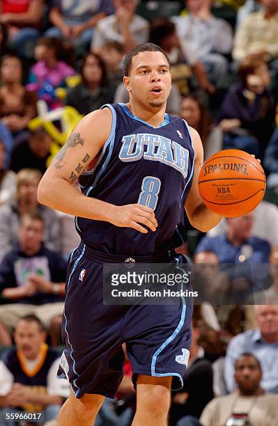 Deron Williams of the Utah Jazz controls the ball during the preseason game against the Indiana Pacers at Conseco Fieldhouse on October 13, 2005 in...