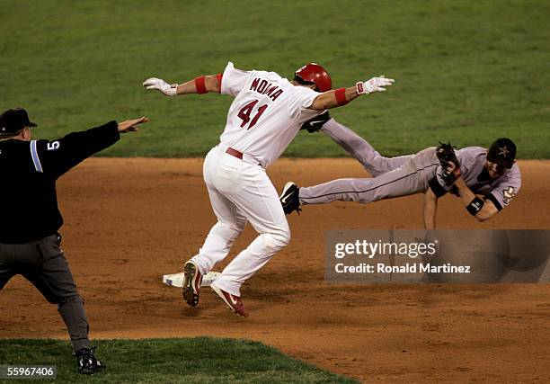 Adam Everett of the Houston Astros makes the out on Yadier Molina of the St. Louis Cardinals in the fifth inning of Game Six of the National League...