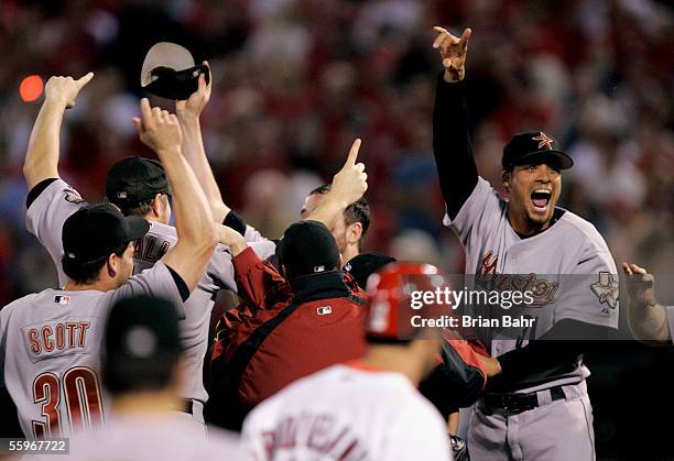 Charles Gipson of the Houston Astros celebrates with teammates following the Astros 5-1 win over the St. Louis Cardinals in Game Six of the National...