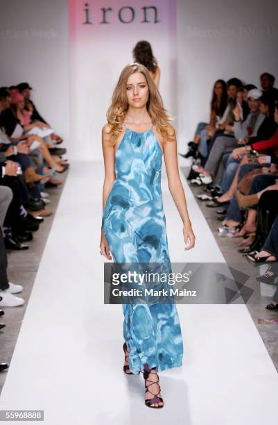 Model walks the runway at the Iron Spring 2006 show during Mercedes-Benz Fashion Week at Smashbox Studios on October 19, 2005 in Culver City,...