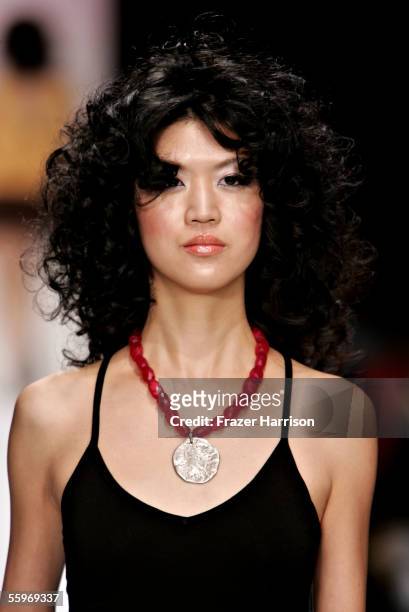 Model walks the runway at the J'aime/Maddie Spring 2006 show during Mercedes-Benz Fashion Week at Smashbox Studios on October 19, 2005 in Culver...