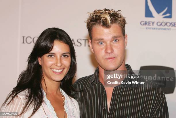 Actor Zachary Ty Bryant and his fiance Carly Matros arrive at the launch party for Robert Redford's "Iconoclasts" at Hanger 8 on October 19, 2005 in...