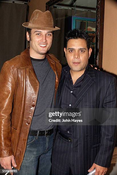 Alex A. Quinn, left, son of the late Anthony Quinn and Raul Julia-Levy pose for photographers during the DVD release party for "Last Goodbye" October...