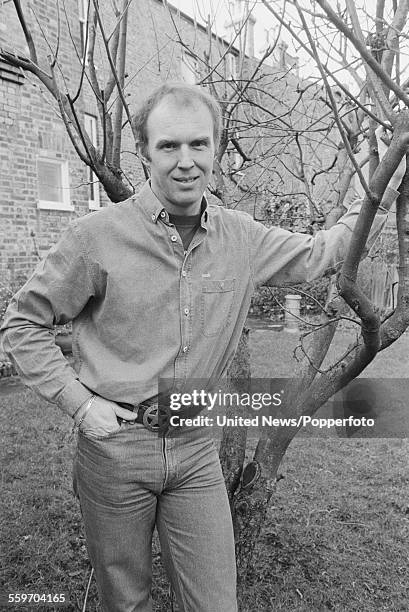 English actor Tim Pigott-Smith pictured standing in his garden at home in Highgate, London on 8th February 1984.