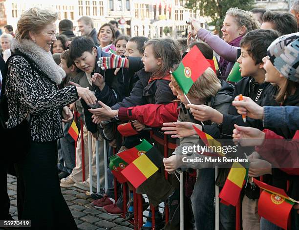 Queen Paola greets fans at the Grote Markt on October 20, 2005 in Antwerp, Belgium.The President of the Portuguese Republic, Jorge Sampaio and his...