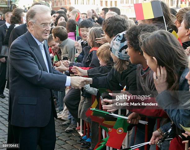 Portuguese President Jorge Sampaio greets fans at the Grote Markt on October 20, 2005 in Antwerp, Belgium. The President of the Portuguese Republic,...