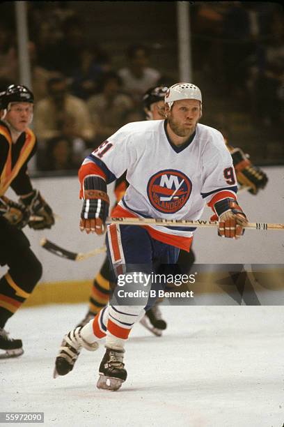 Canadian hockey player Butch Goring of the New York Islanders skates up the ice during a game against the Vancouver Canucks, May 1982.