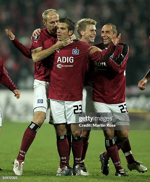 Sergej Barbarez, Rafael van der Vaart, Rene Klingbeil and Stefan Beinlich of Hamburg celebrate scoring the first goal during the UEFA Cup Group A...