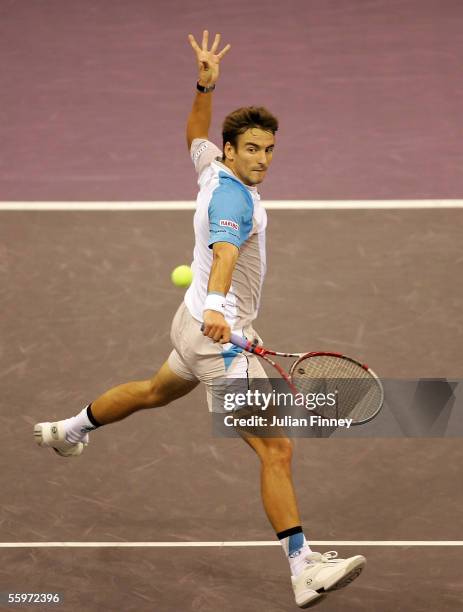 Tommy Robredo of Spain in action against Rafael Nadal of Spain in the third round of the ATP Madrid Masters at the Nuevo Rockodromo on October 20,...