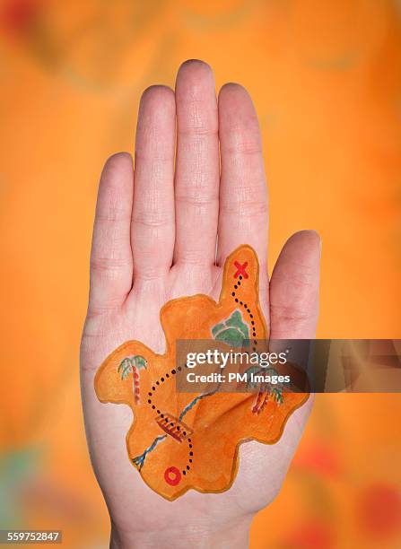 Treasure map on woman's hand