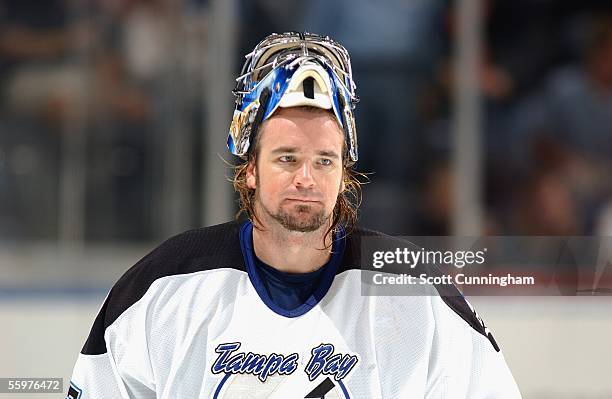 Goalie John Grahame of the Tampa Bay Lightning leaves the ice after a shutout against the Atlanta Thrashers October 20, 2005 at Philips Arena in...