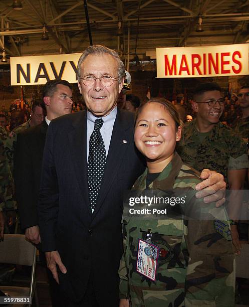 Secdef Rumsfeld Secretary Of Defense Rumsfeld Visits Troops Photos and Premium High Res ...
