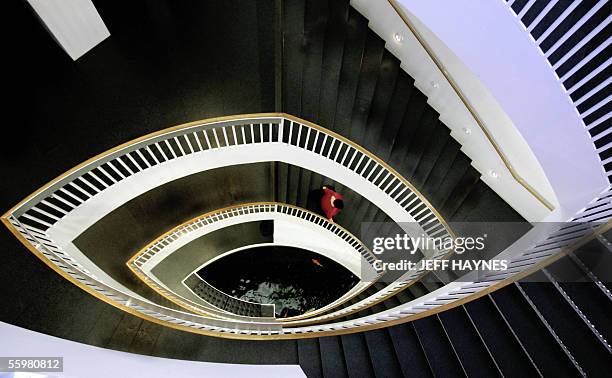 Chicago, UNITED STATES: A visitor walks down the steps at the Museum of Contemporary Art in Chicago, Illinois 21 October, 2005. One of the nation's...