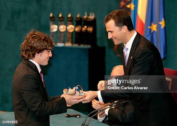 Formula One World Champion Fernando Alonso receives from Crown Prince Felipe of Spain an Award for sports during Prince Of Asturias Awards Ceremony...