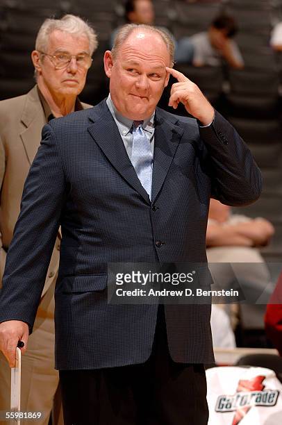 George Karl, head coach of the Denver Nuggets, makes a gesture during pregame against the Washington Wizards on October 21, 2005 at the Staples...