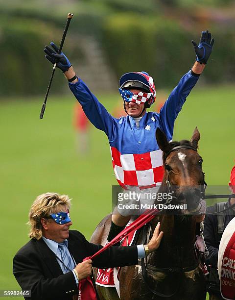 Owner Tony Santic leads Makybe Diva with Glen Boss on board back to scale after winning the 2005 Cox Plate during the 2005 Cox Plate Race Day at...