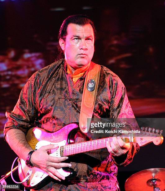 Actor Steven Seagal performs during the abolition of nuclear weapons concert on October 22, 2005 in Tokyo, Japan. The concert is supported by the...