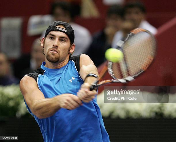 Robby Ginepri of America in action against Rafael Nadal of Spain during the Semi- Final of the ATP Madrid Masters at the Nuevo Rockodromo on October...