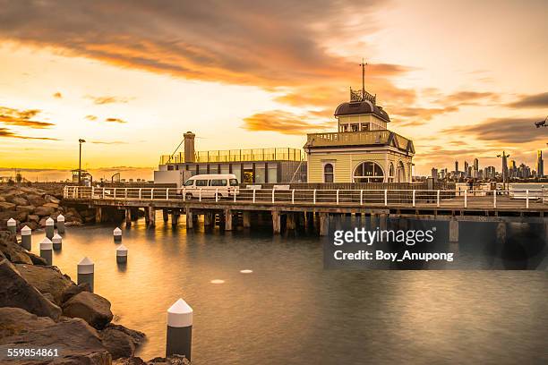 st.kilda pier in the evening time - st kilda beach stock pictures, royalty-free photos & images