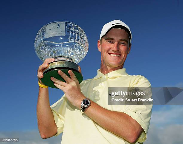 Marc Warren of Scotland poses with the trophy after winning The Challenge Tour Order of Merit after the delayed final round of The Challenge Tour...