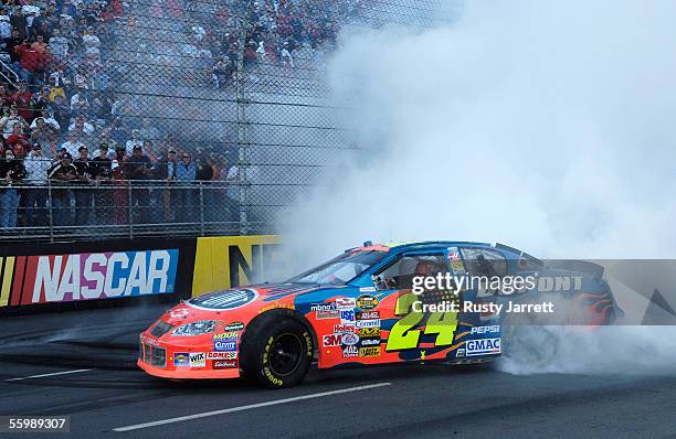 Jeff Gordon, driver of the DuPont Chevrolet, celebrates winning the NASCAR Nextel Cup Series Subway 500 on October 23, 2005 at the Martinsville...