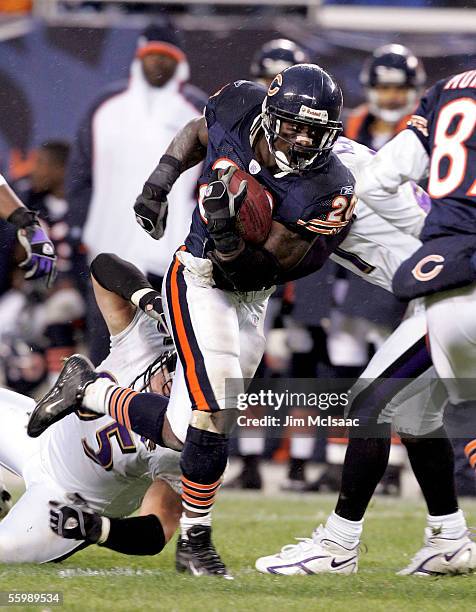 Running back Thomas Jones of the Chicago Bears runs the ball against the Baltimore Ravens during their game on October 23, 2005 at Soldier Field in...