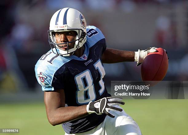 Wide receiver Brandon Jones of the Tennessee Titans runs after a pass against the Arizona Cardinals during the third quarter at Sun Devil Stadium on...